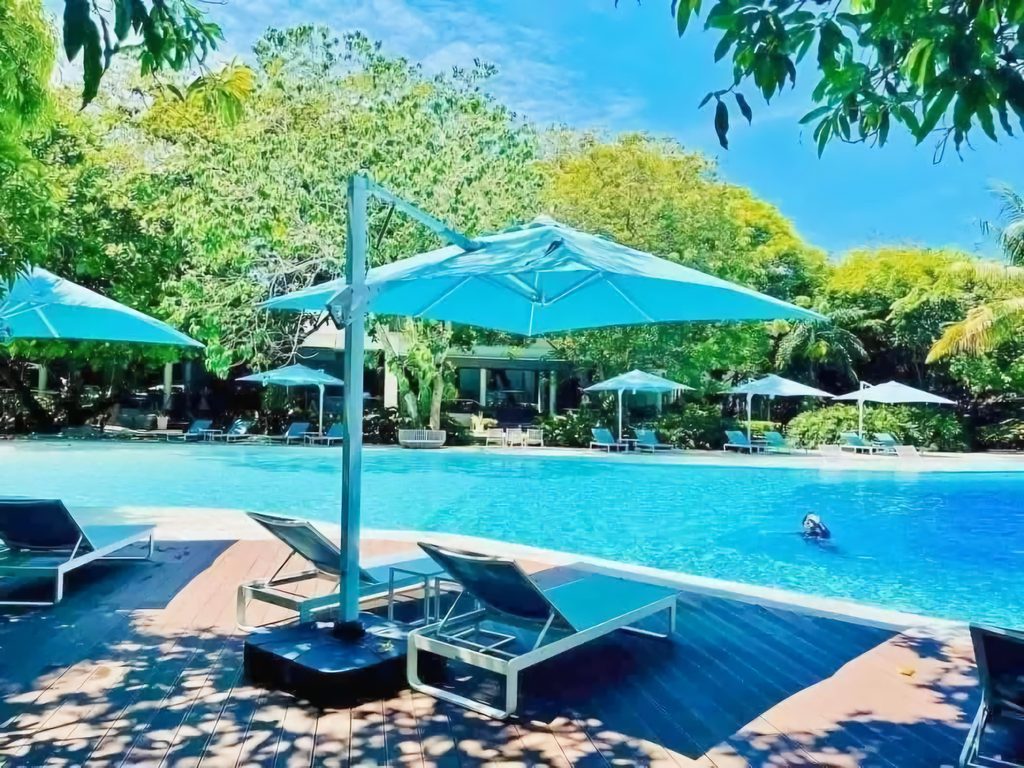 Poolside area at Tambuli Seaside Resort