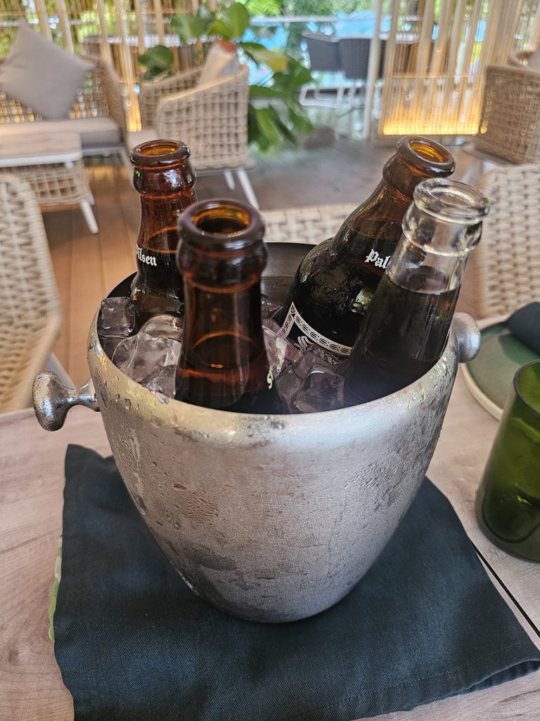 Chilled beer bottles served in an ice bucket at Tambuli Seaside Resort Cebu