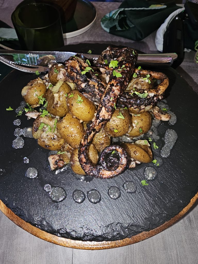 grilled seafood with potatoes.