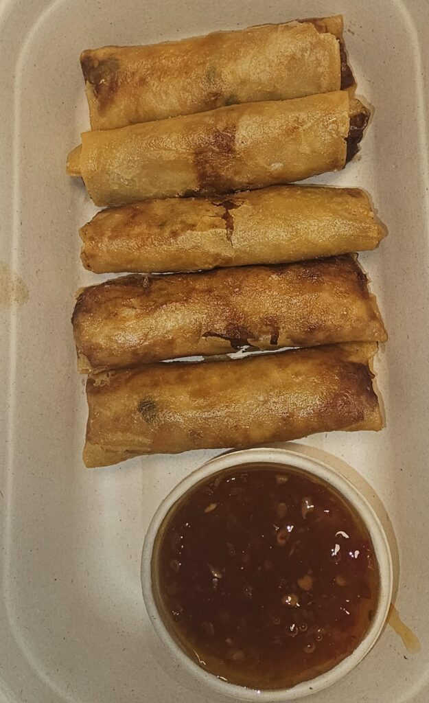 Crispy spring rolls with dipping sauce at Tambuli Seaside Resort Cebu