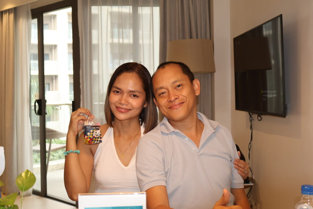 Mom posing with dad indoor
